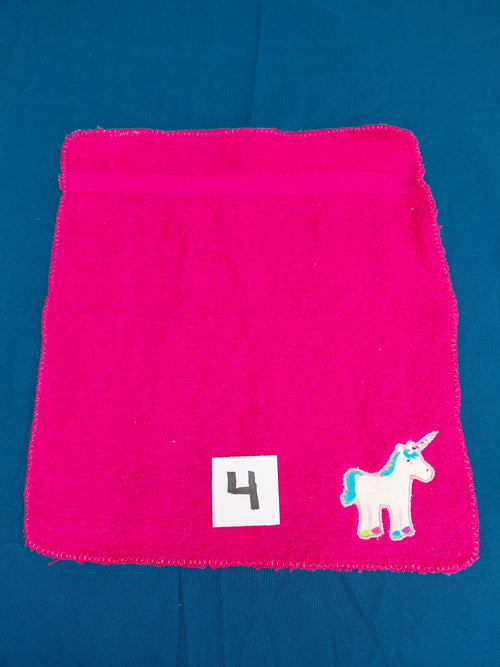 Bright pink embellished washcloth with unicorn, reinforced hem