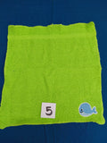 Bright lime green embellished washcloth with whale, reinforced hem