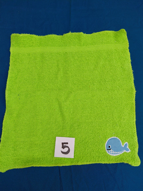 Bright lime green embellished washcloth with whale, reinforced hem