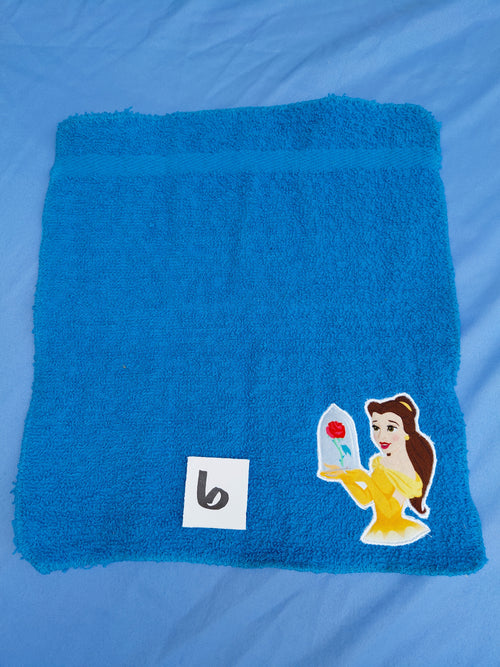 Bright aqua blue embellished washcloth with princess design, reinforced hem