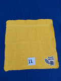 Bright deep gold embellished washcloth with raccoon, reinforced hem

