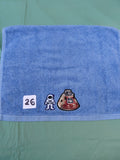 Sky blue embellished hand towel with astronaut and space capsule, reinforced hem