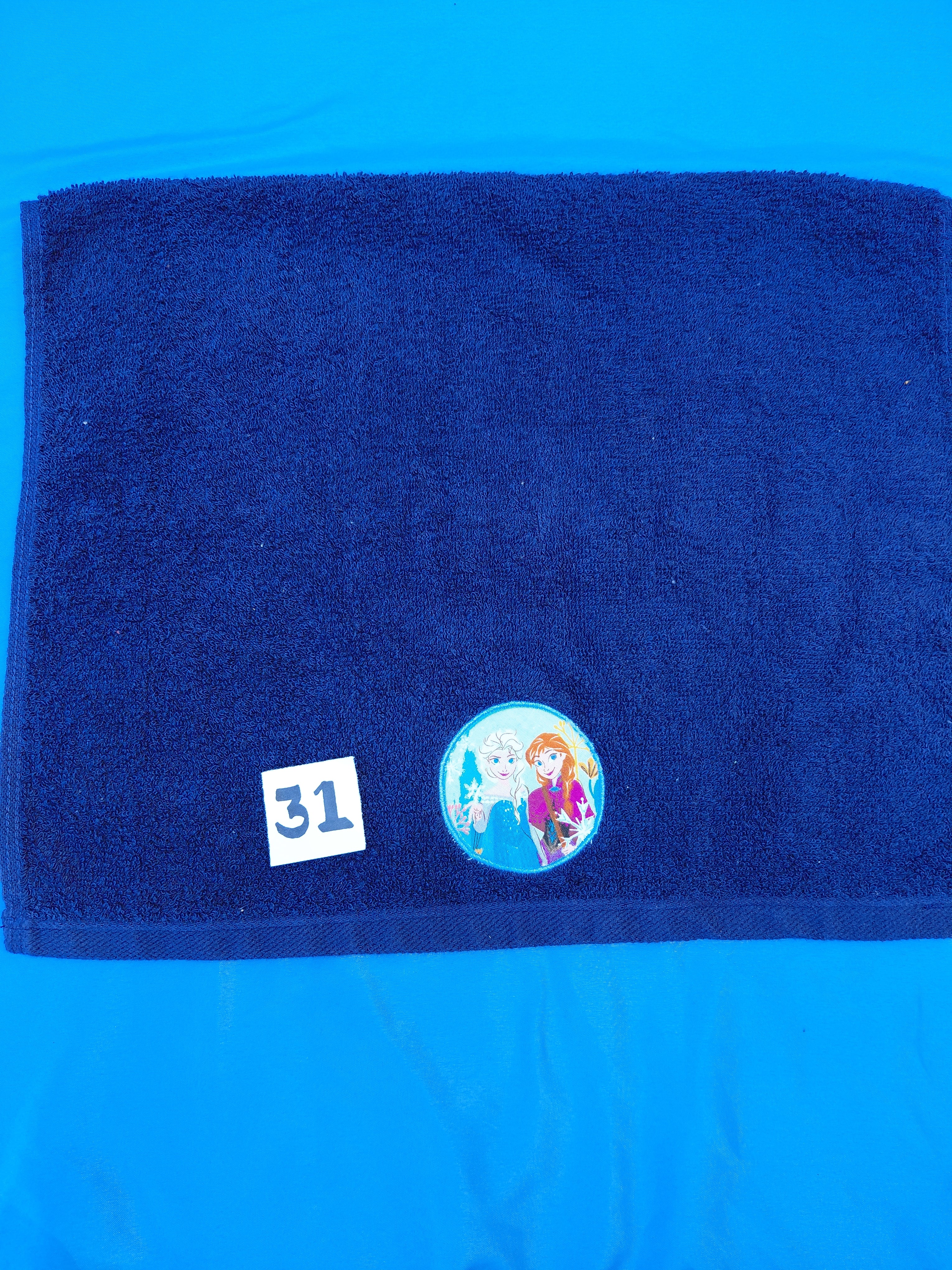 Dark blue handcrafted embellished hand towel with two princesses appliqué, reinforced hem