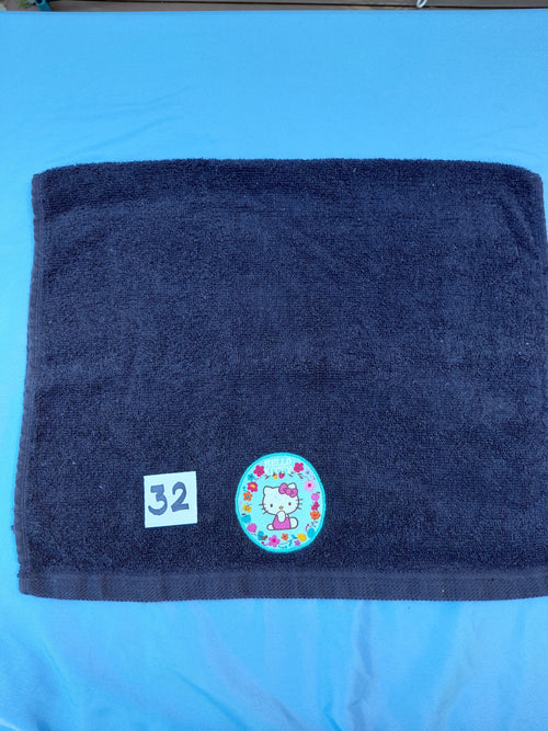 Black handcrafted embellished hand towel with kitty appliqué, reinforced hem