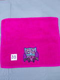 Magenta handcrafted embellished hand towel with deep purple outlined owl appliqué, reinforced hem