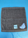 Chocolate brown handcrafted embellished washcloth with snowman appliqué, reinforced hem