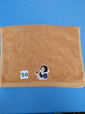Burnt orange handcrafted embellished hand towel with princess appliqué, reinforced hem