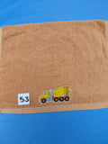 Burnt orange handcrafted embellished hand towel with cement mixer appliqué, reinforced hem