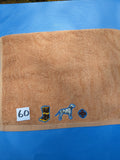 Burnt orange handcrafted embellished hand towel with firefighter boots and dalmatian appliqué, reinforced hem