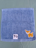 Sky blue handcrafted embellished washcloth with deer appliqué, reinforced hem