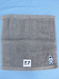 Stormy sky gray handcrafted embellished washcloth with astronaut appliqué, reinforced hem