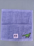 Sky blue handcrafted embellished washcloth with dinosaur appliqué, reinforced hem