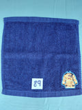 Dark blue handcrafted embellished washcloth with firefighter's coat appliqué, reinforced hem
