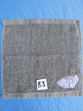 Stormy sky gray handcrafted embellished washcloth with snowman appliqué, reinforced hem