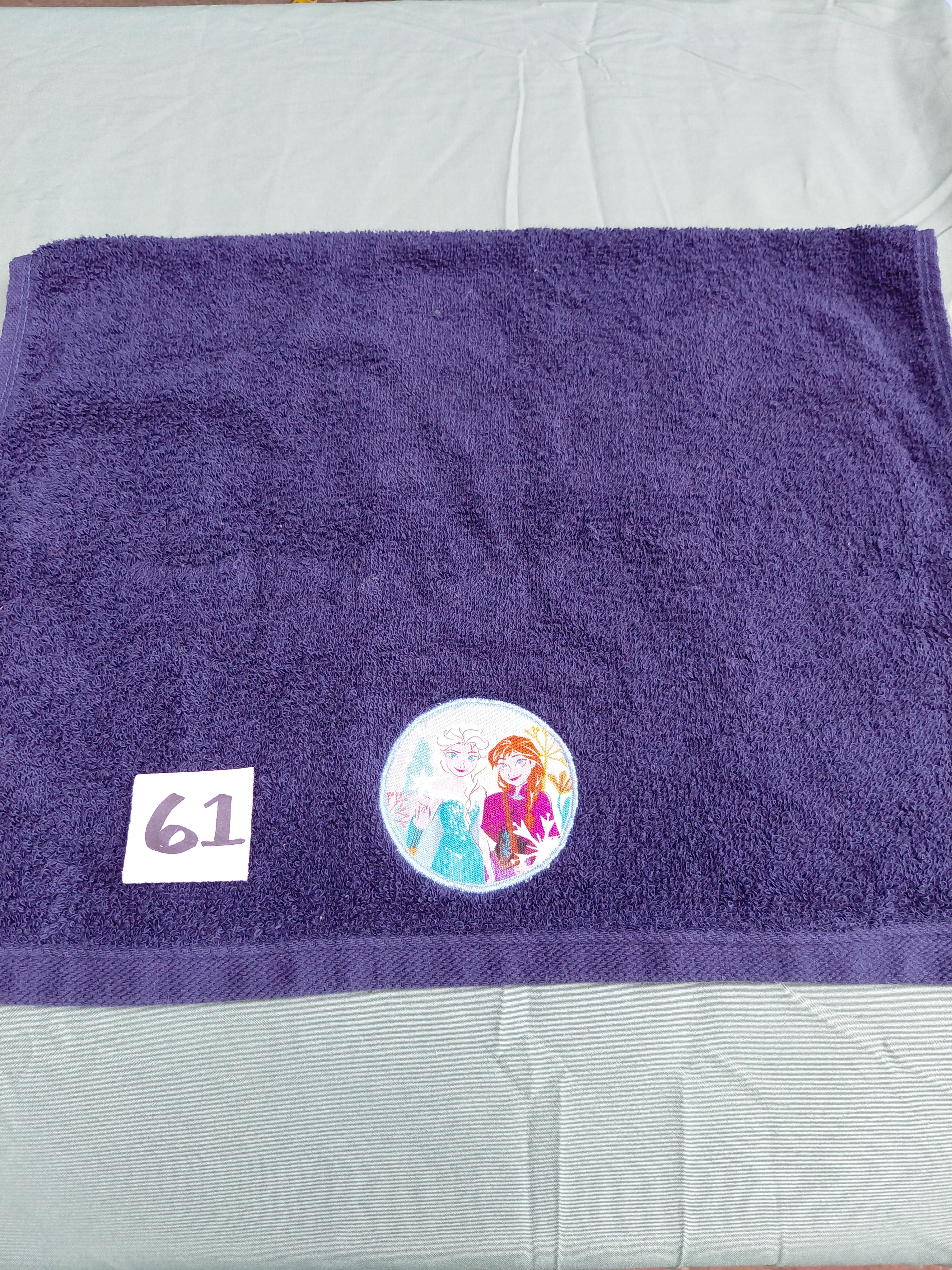 Dark blue handcrafted embellished hand towel with two princesses appliqué, reinforced hem